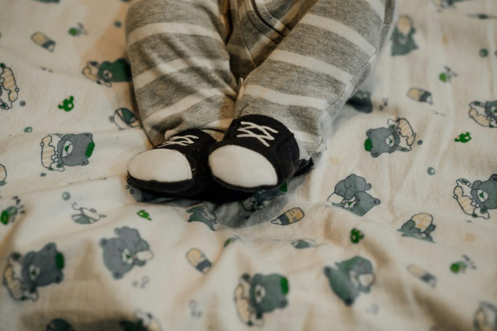 When do babies start wearing shoes?